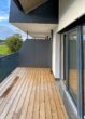 Moderne 3,5 Zimmer Wohnung mit Ausblick und großem Balkon - Bild